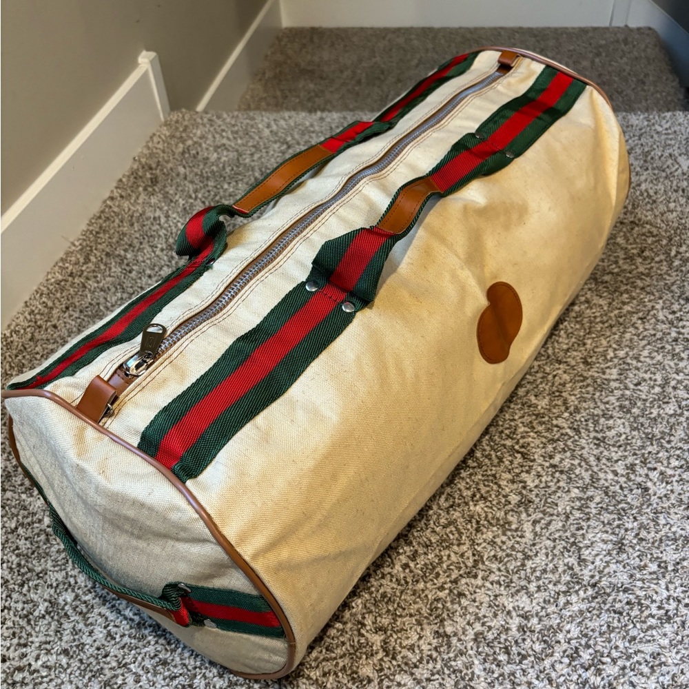 Stylish Cream Duffel Bag with Red and Green Stripes